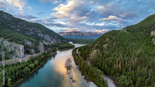 Bild auf Leinwand Aerial Panoramic View of Flathead River Flowing Through Forested Mountain Canyon Near Hungry Horse Montana, USA
