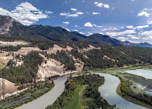 Quadro em tela Aerial high angle view of the Columbia River winding through hills south of Radium Hot Springs, British Columbia, Canada