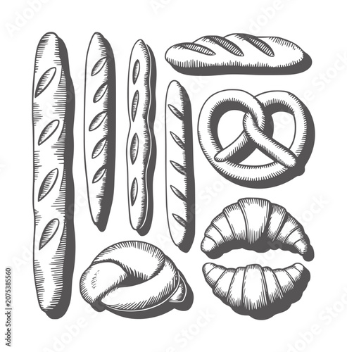 Foto Assortment of baked goods including baguettes croissants pretzel and loaf bread