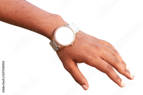 Bild auf Leinwand Brown skin tone hand wearing a silver metallic wristwatch with a blank white circular clock face isolated against a plain white background for commercial use