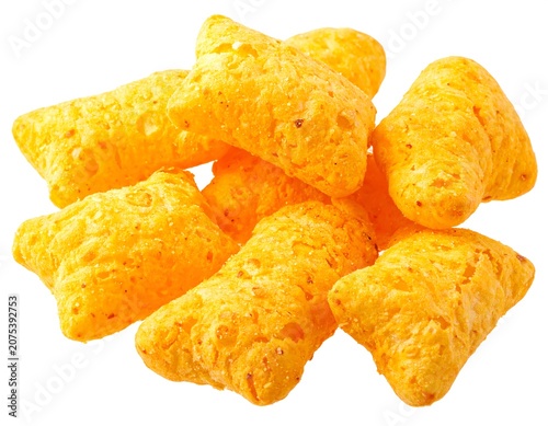 A close-up photo of a pile of cheesy puffed corn snacks