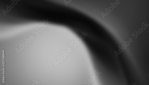Abstract smooth flowing grey waves creating a soft elegant background with gentle light and shadows