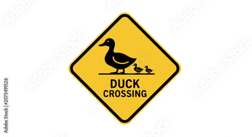 Yellow diamond caution sign with black silhouette of a mother duck and two ducklings crossing.