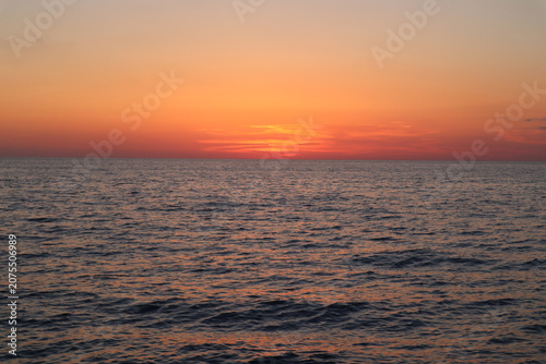 Sea sunset with orange sky