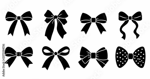 Eight black bow including a polka dot on white background