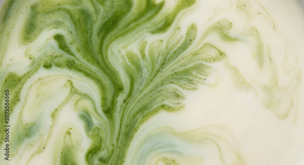 Obraz premium Abstract green and white matcha latte liquid swirling marbling texture