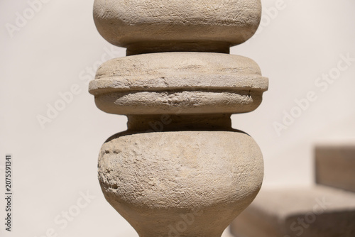 Classic stone balusters made of sandstone. Traditional staircase railing. Krakow. Poland