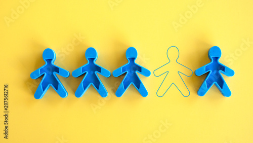 Принти на полотні Row of blue plastic human figures with one missing person empty outline silhouet