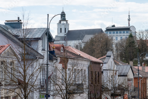 Old town rooftops and church tower in a European city