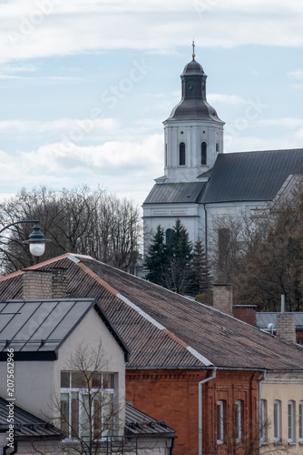 Old town rooftops and church tower in a European city