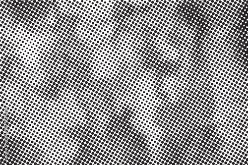 Abstract black and white halftone dots pattern background.
