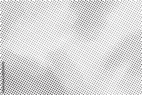 Abstract black and white halftone dots pattern background.