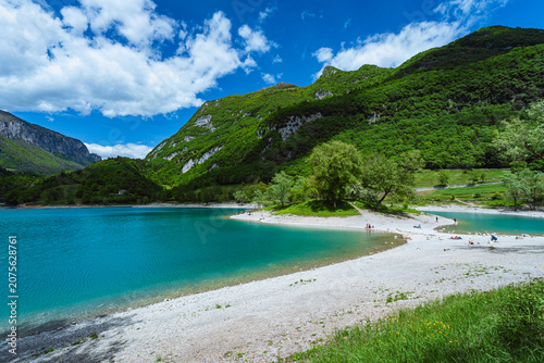 The view of Lake Tenno, a splendid alpine lake nestled between mountains and woods, near Lake Garda, near the town of Tenno, Trentino, Italy - May 2026