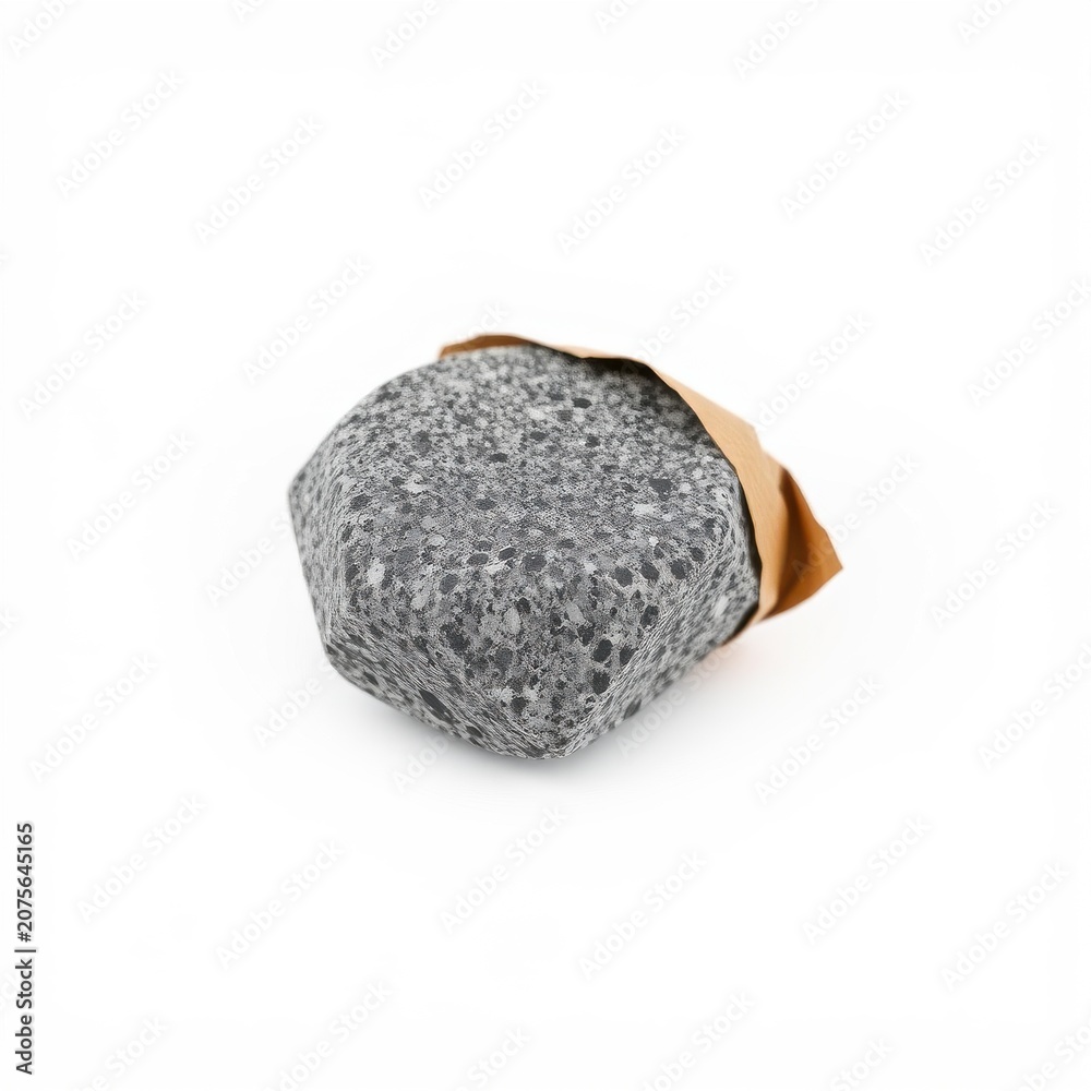 Fototapeta premium Gray solid shampoo bar partially wrapped in brown paper. Minimalist product presentation, clean background, simple composition.