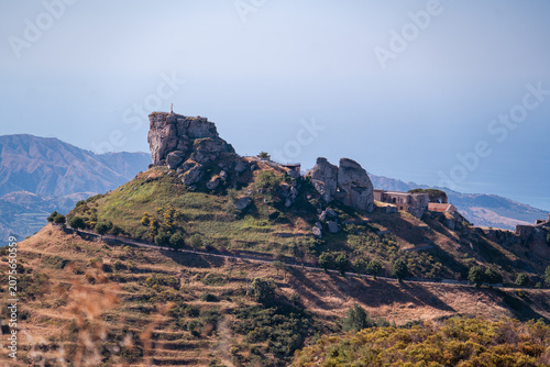 Obraz na plátně Historic Norman castle rock with a summit cross in Bova town, Calabria
