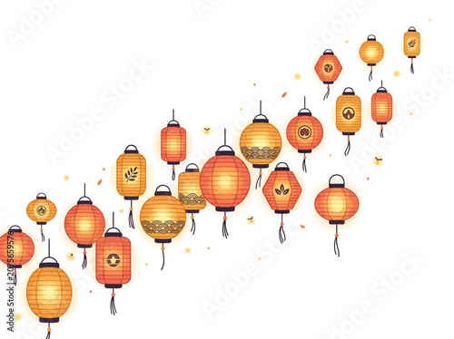 Obraz na płótnie Vibrant red and orange lanterns hang in the air with sparkling particles