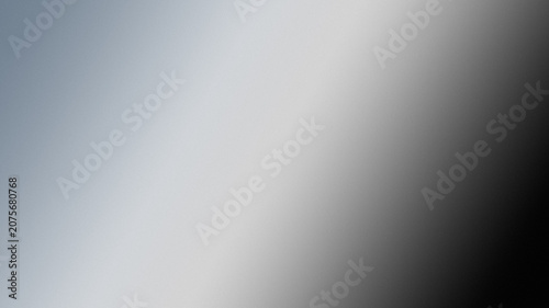 Fotografija A smooth abstract gradient transition shifting from light grey to dark charcoal
