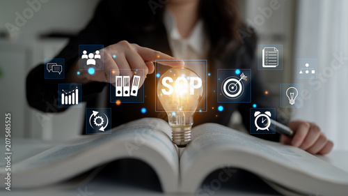 Canvastavla Innovative Business Concept with Light Bulb, Standard Operating Procedures, and Digital Icons for Creative Solutions in Modern Workplace