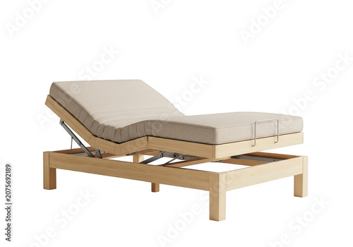 Adjustable bed with mattress on wooden frame on grey background.