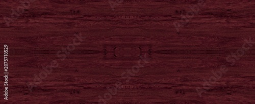 Obraz na plátně Dark burgundy wood texture featuring a symmetrical pattern with rich grain detai