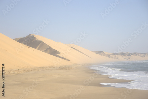 Massive Sand Dunes Meeting the Atlantic Ocean at Skeleton Coast, Namib Desert, Namibia - Dramatic Desert Coastline Landscape