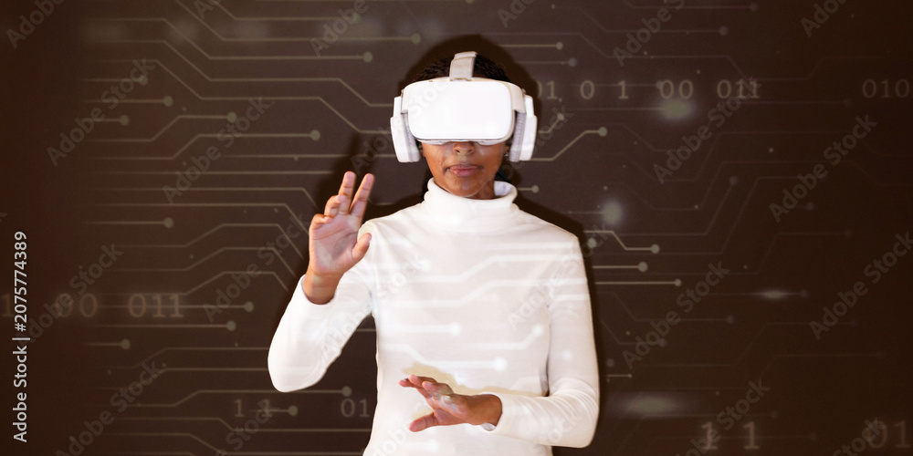 Naklejka premium Woman using virtual reality headset with futuristic digital interface