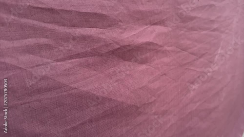 Child pressing a star onto a fabric backdrop in a playful crafting scene
