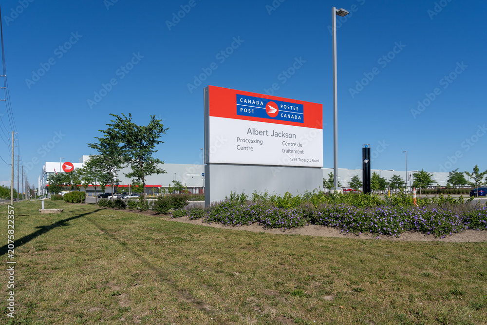 Obraz premium Toronto, Canada - June 27, 2026: Canada Post Albert Jackson Processing Centre on Tapscott Rd in Scarborough, Toronto, Ontario. The facility is Canada Post's largest parcel sorting center. 
