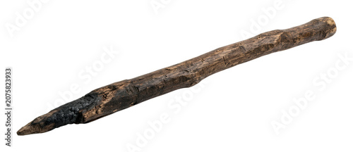 Rustic charred wooden stake with pointed end isolated on transparent background