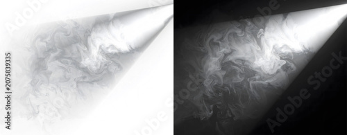 Smoke swirling in spotlight beams.