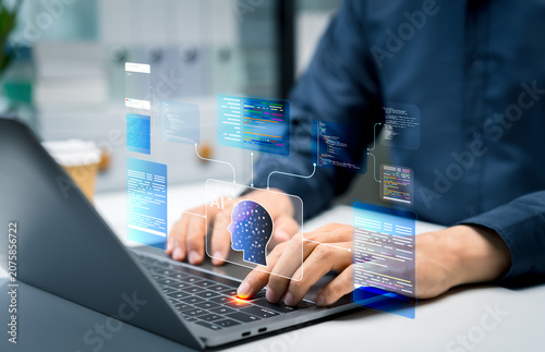Fotografie Programmer using AI coding tools on a laptop for code generation, intelligent assistance, database management, task automation, and software optimization