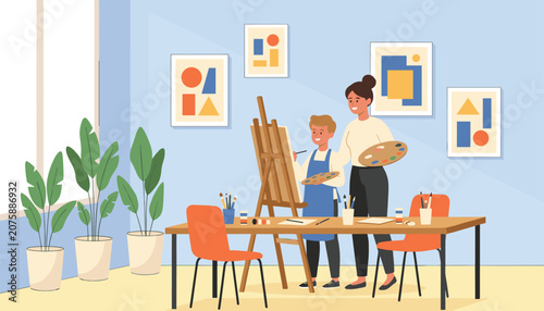 Young boy learning to paint on a canvas with the help of his friendly female art teacher in a creative classroom studio.