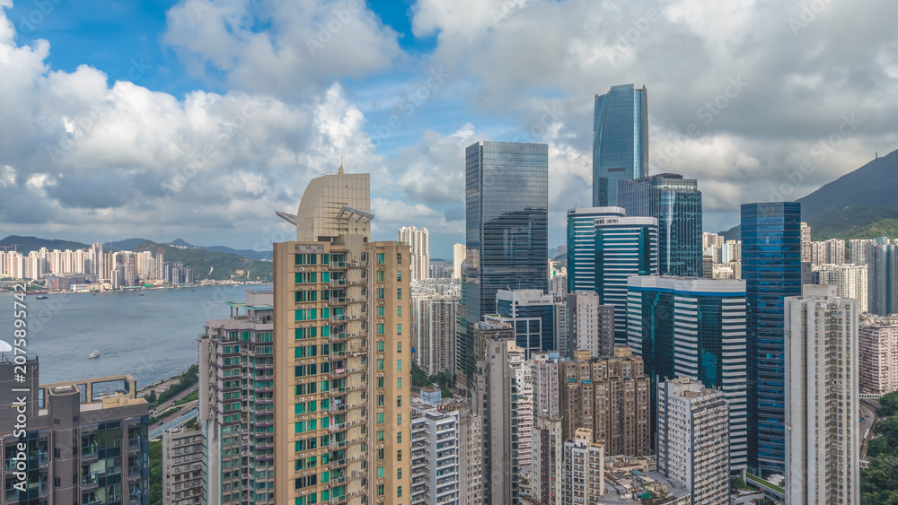 Fototapeta premium June 20 2026 hk. Quarry Bay Skyline Over Victoria Harbour View