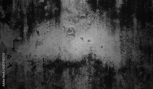 Foto Dark gritty black and grey concrete wall with heavy weathered texture, concrete