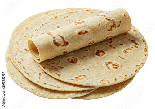 Three fresh, soft, light brown corn flour tortillas, one rolled on two stacked, subtly textured, with cooking marks on a transparent background with copy space, Mexican cooking concept