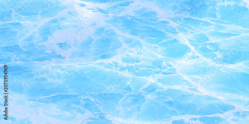 Fotografie Light blue and white marbled texture background with smooth flowing patterns