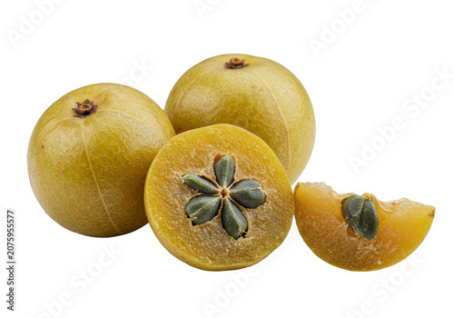 Dried dark golden-brown Indian gooseberry (Amla) fruits, whole, half-cut, revealing fibrous structure, on transparent background with copy space, soft green leaves, natural health concept