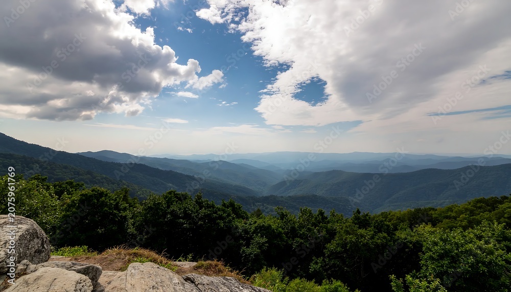 Fototapeta premium Panoramic View of Mountainous Landscape with Cloudy Sky.