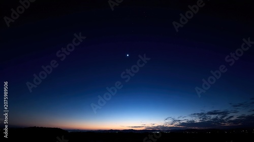 venus. The morning star visible above the horizon before sunrise in a dark blue sky. travel magazines, destination branding, designed for travel destination branding, used by web designers.