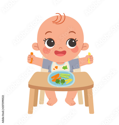 Cute little baby sitting in highchair and eating healthy food vegetables on white background.