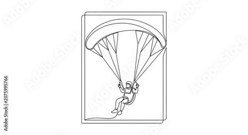 paraglider flying in the air