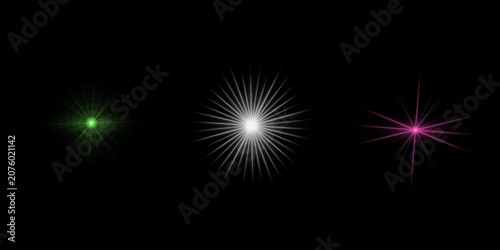 Collection of glowing star light bursts in green white and pink featuring sharp radial lines isolated on dark black screen backdrop.