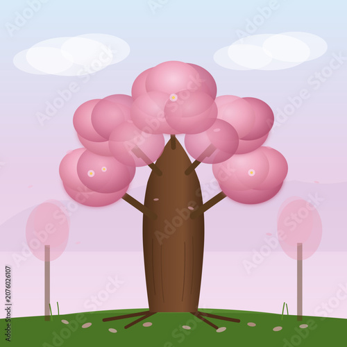Cherry blossom tree in full bloom on green hill with clouds