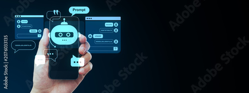 Chatbot interface holograms floating around a hand holding a smartphone against a dark tech background showcasing digital communication concept.