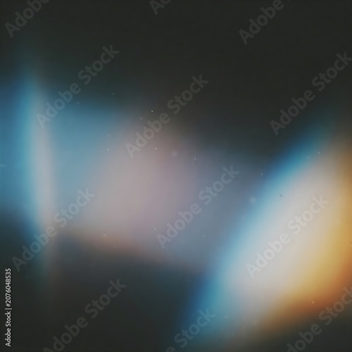 Abstract gradient of blue orange and white light on dark background creating smooth ethereal reflection and mysterious effect
