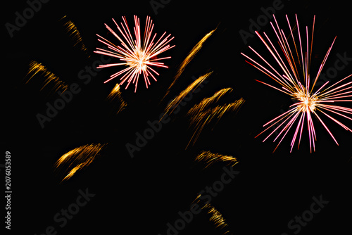 Fireworks lighting up the night sky. Pyrotechnics, abstract	