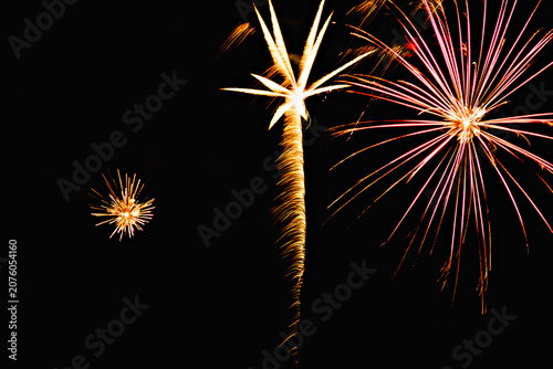 Fireworks lighting up the night sky. Pyrotechnics, abstract	