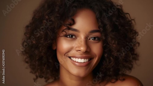 Beautiful Black Woman with Curly Hair Smiling Happy. 4K Video