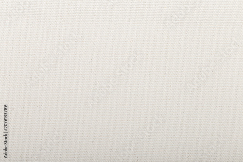 Foto Off white canvas fabric texture background