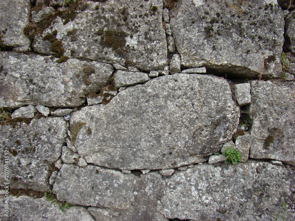 Fototapeta premium Old rough weathered granite stone wall texture background